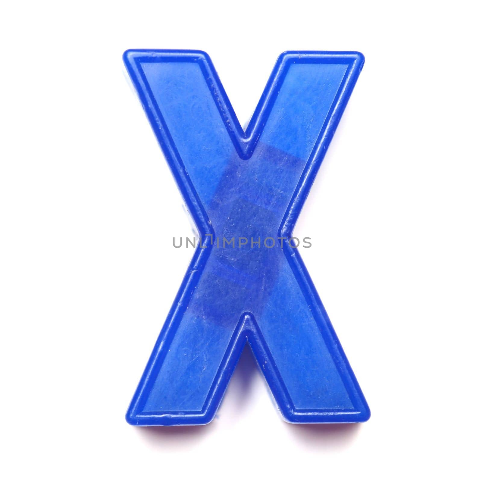 Magnetic uppercase letter X of the British alphabet