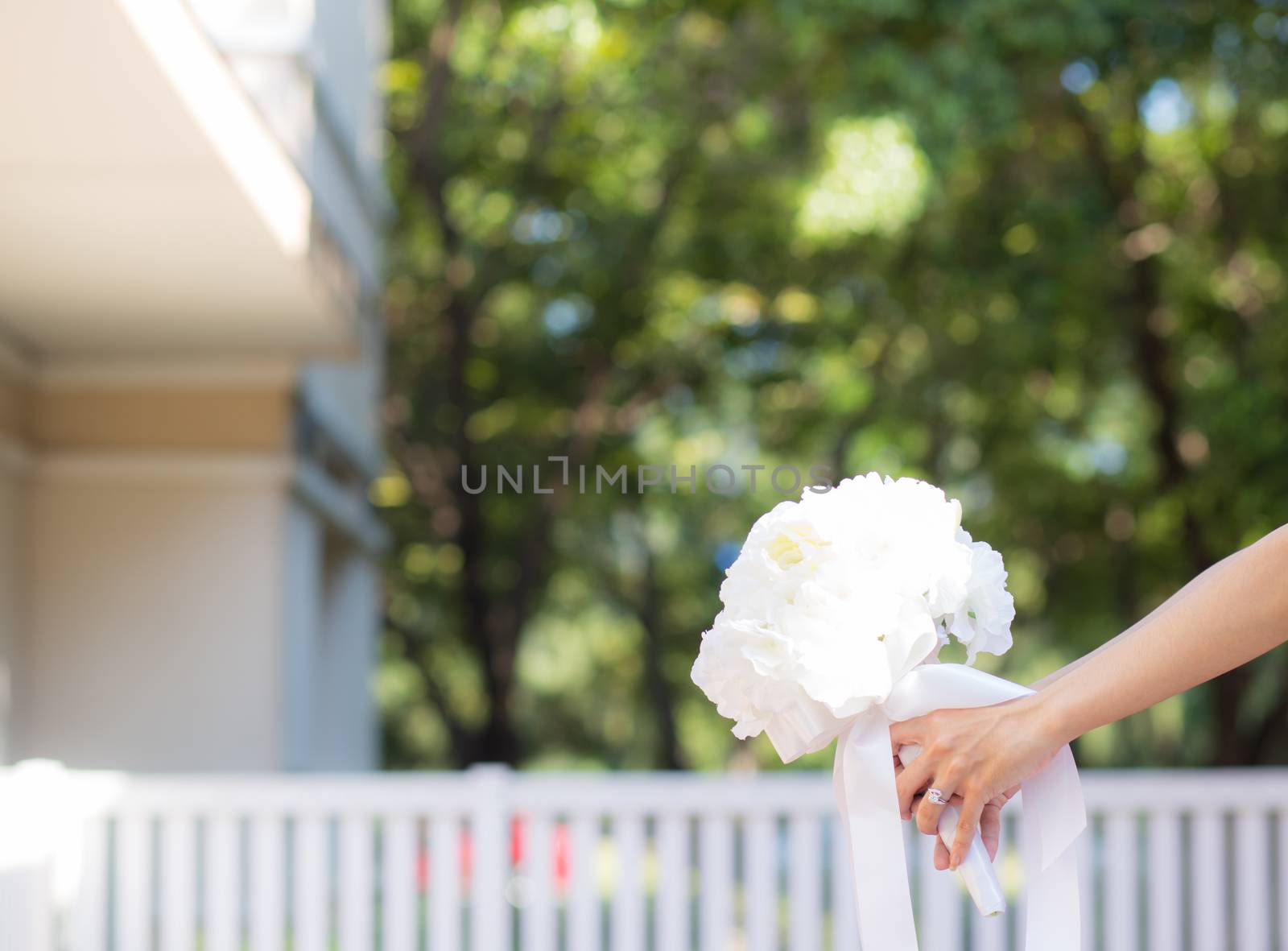 Beautiful wedding bouquet in hands of the bride by nnudoo