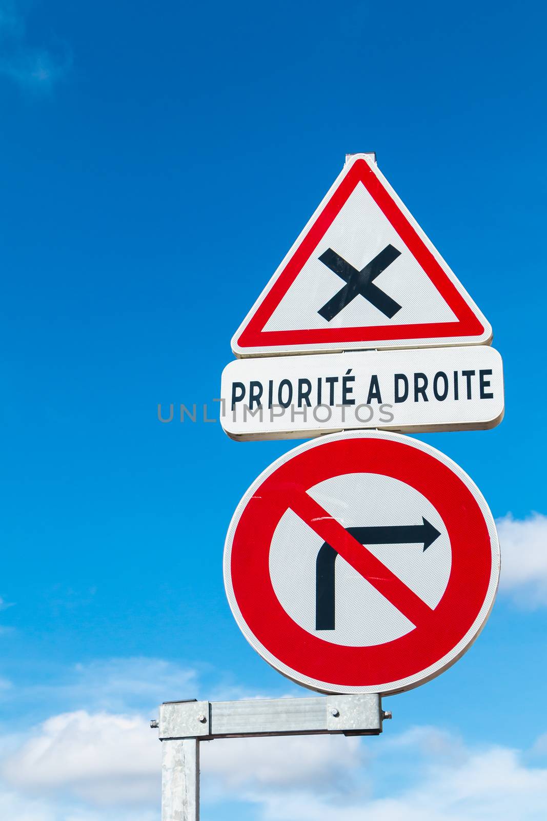 in the street, french sign prohibiting a right turn and the priority right