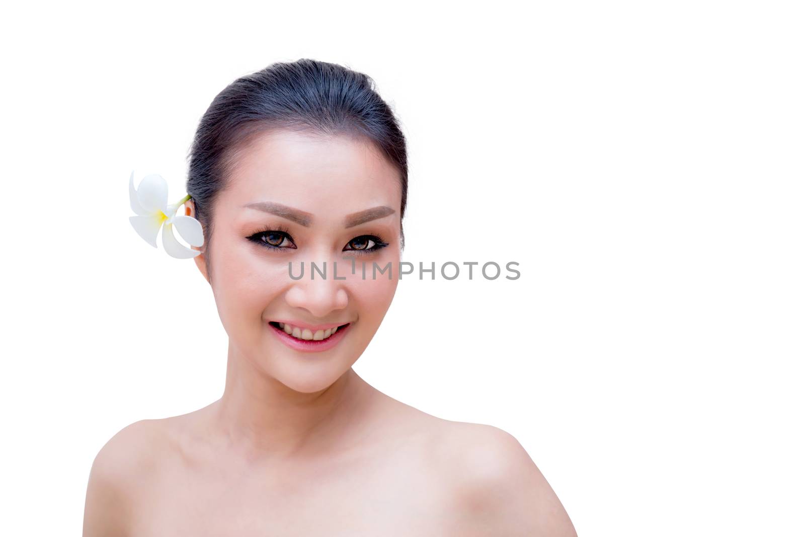 Beauty Woman face Portrait. Beautiful Spa model Girl with Perfect Fresh Clean Skin. female looking at camera and smiling. Youth and Skin Care Concept. Isolated on a white background