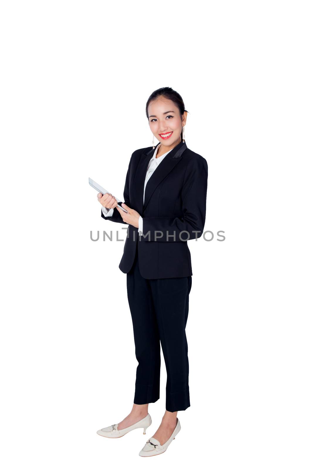 Young woman holding using touch pad tablet computer, isolated on white background, model is a asian beauty