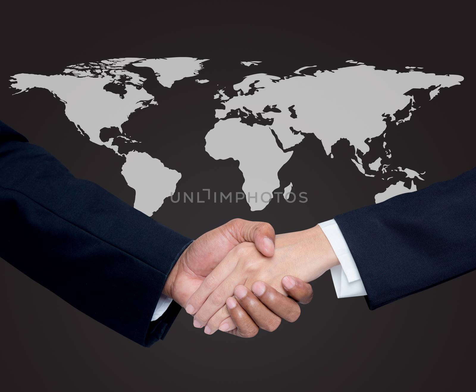Business with people shaking hands with a global background by nnudoo