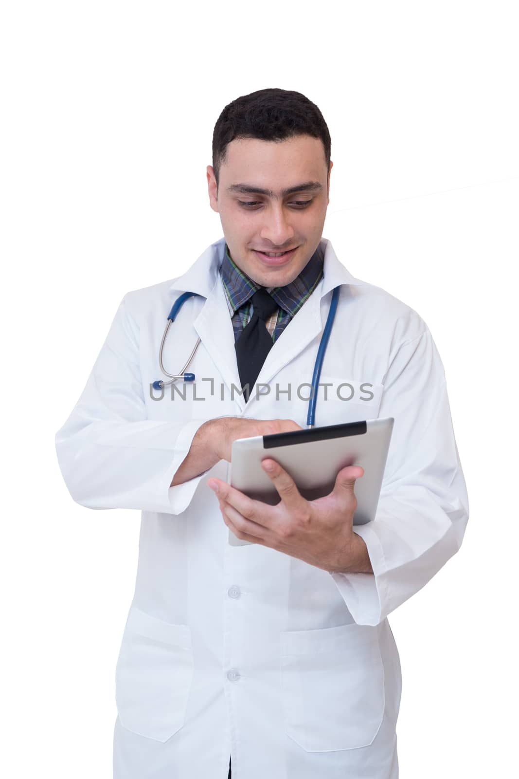 Doctor holding a tablet computer while using it isolated on white background