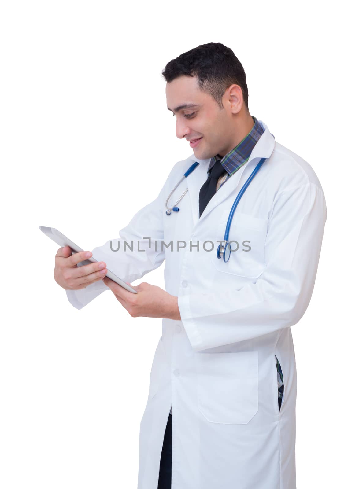 Doctor holding a tablet computer while using it isolated on white background