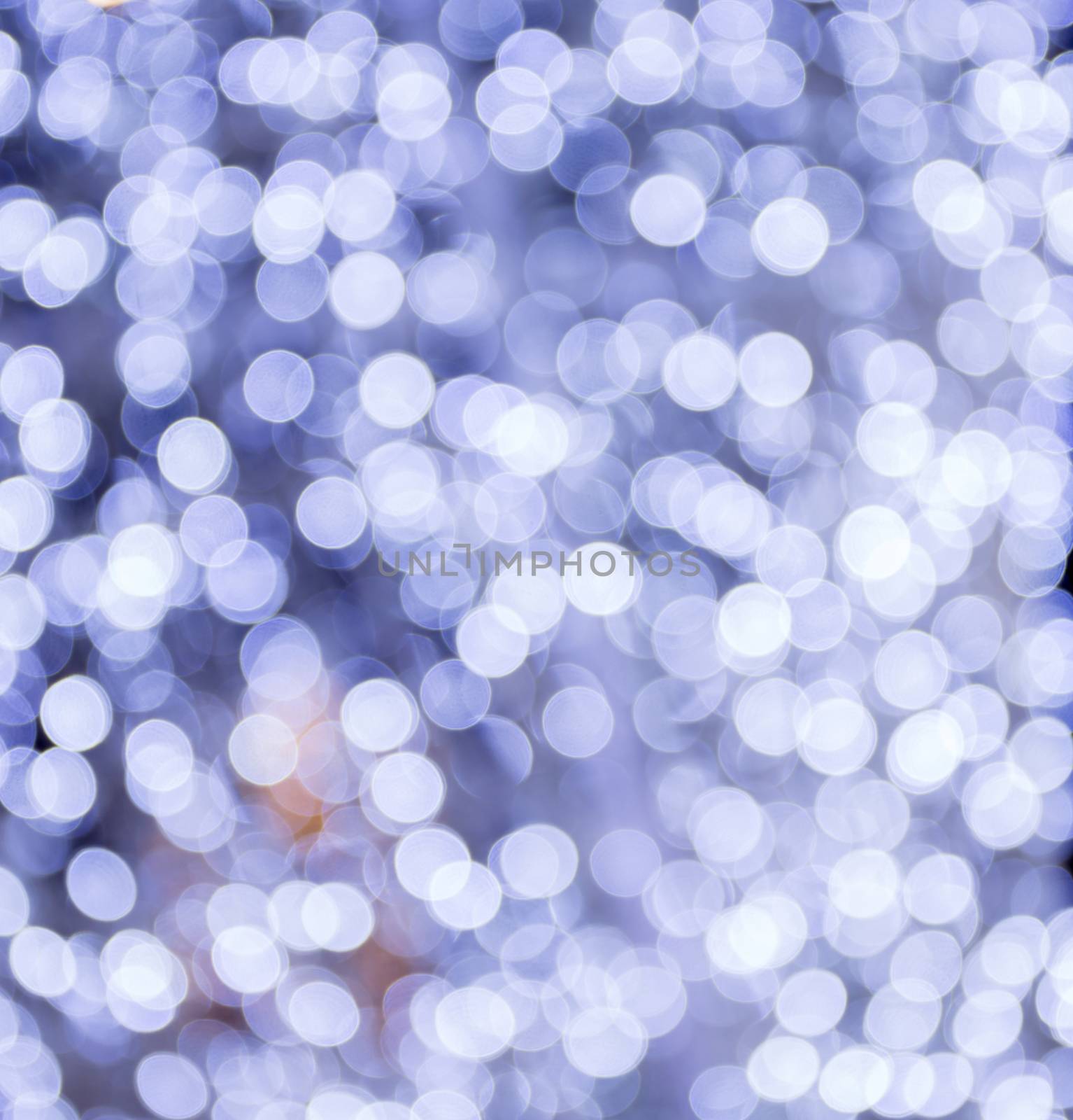 Christmas background. Festive xmas abstract background with bokeh defocused lights.