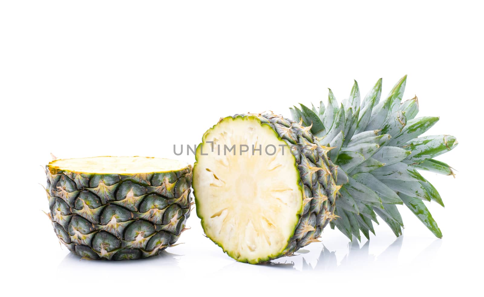 Fruit pineapple on a white background by sompongtom