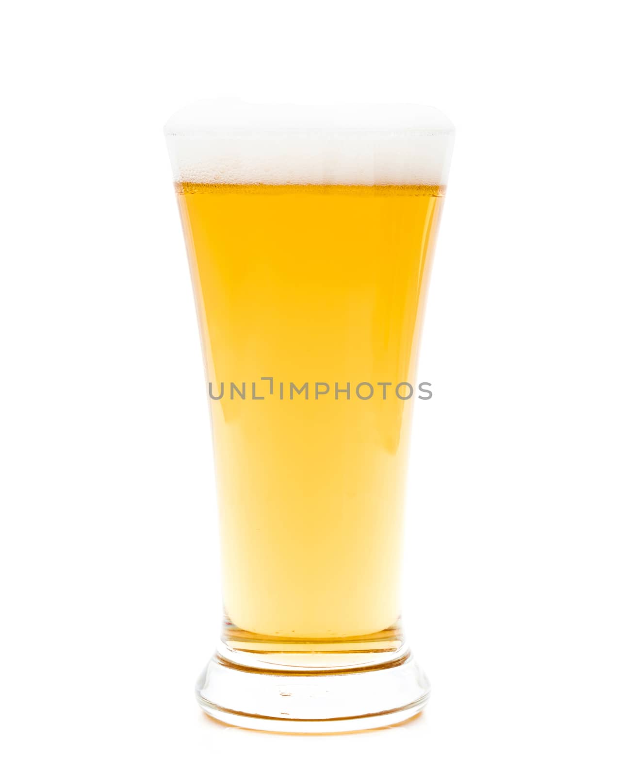 Beer in a glass on white background by sompongtom