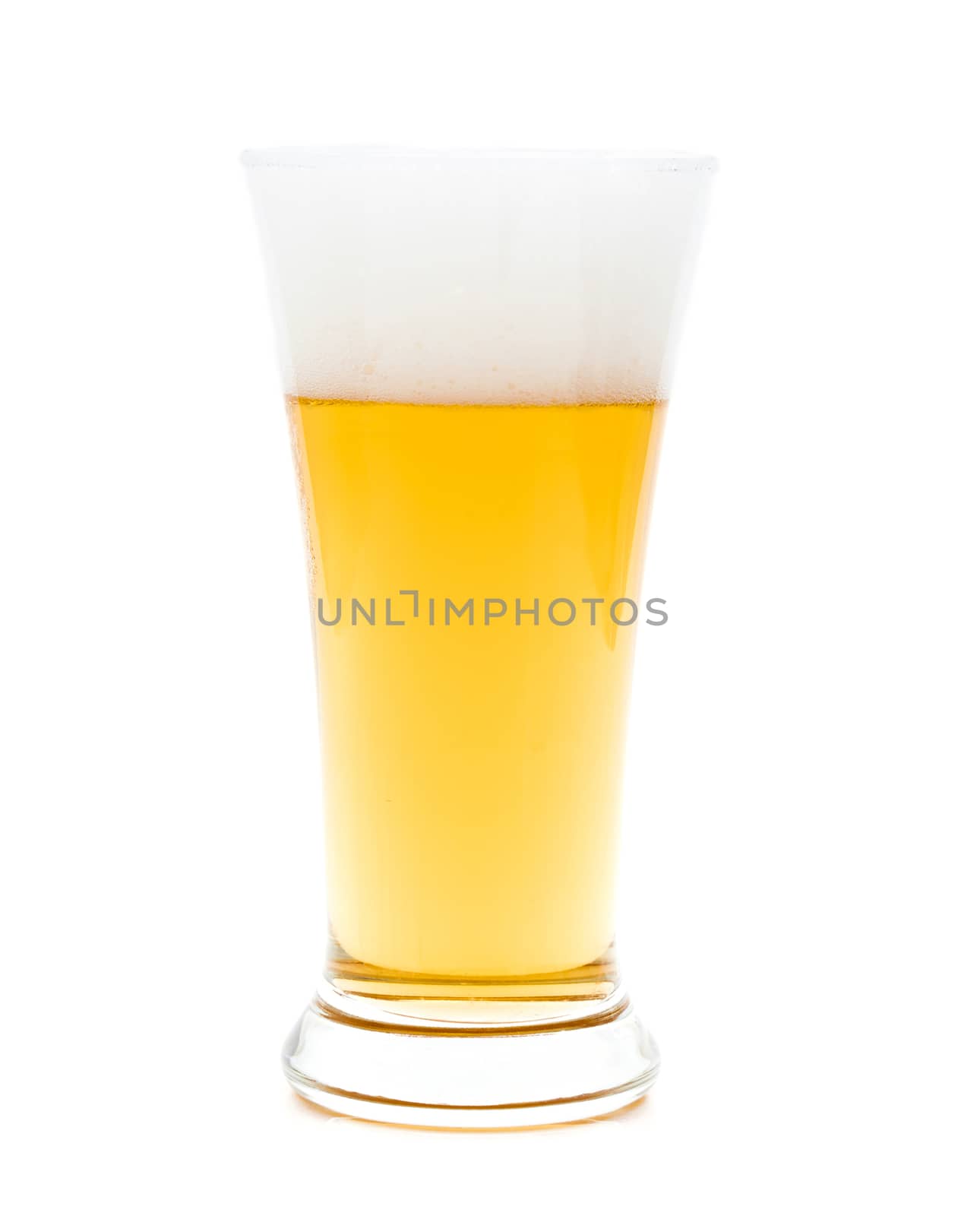 Beer in a glass on white background by sompongtom