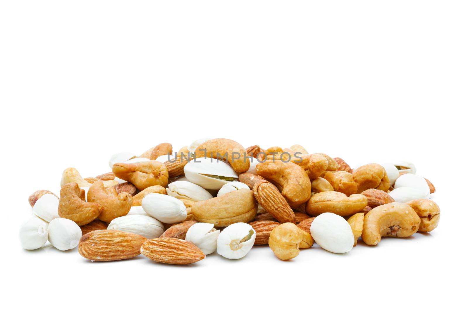Almonds Pistachio and  Cashews in a sack on a white background by sompongtom
