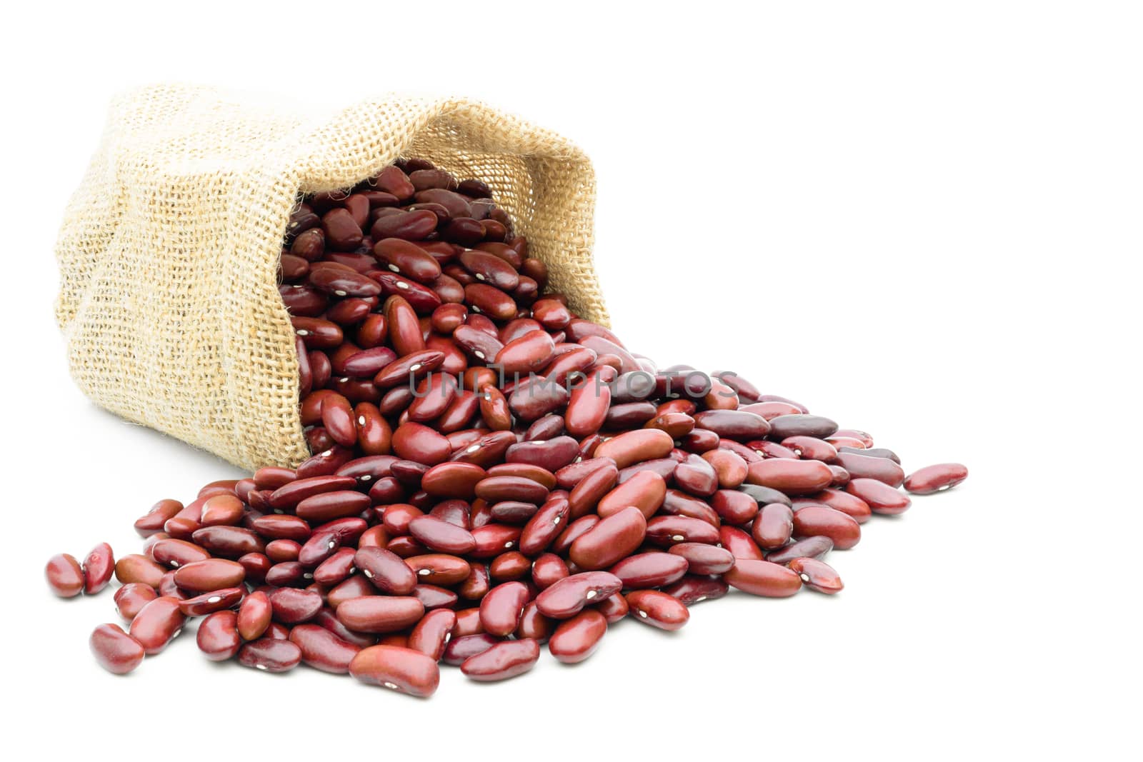 Grains Red beans in a sack on a white background by sompongtom