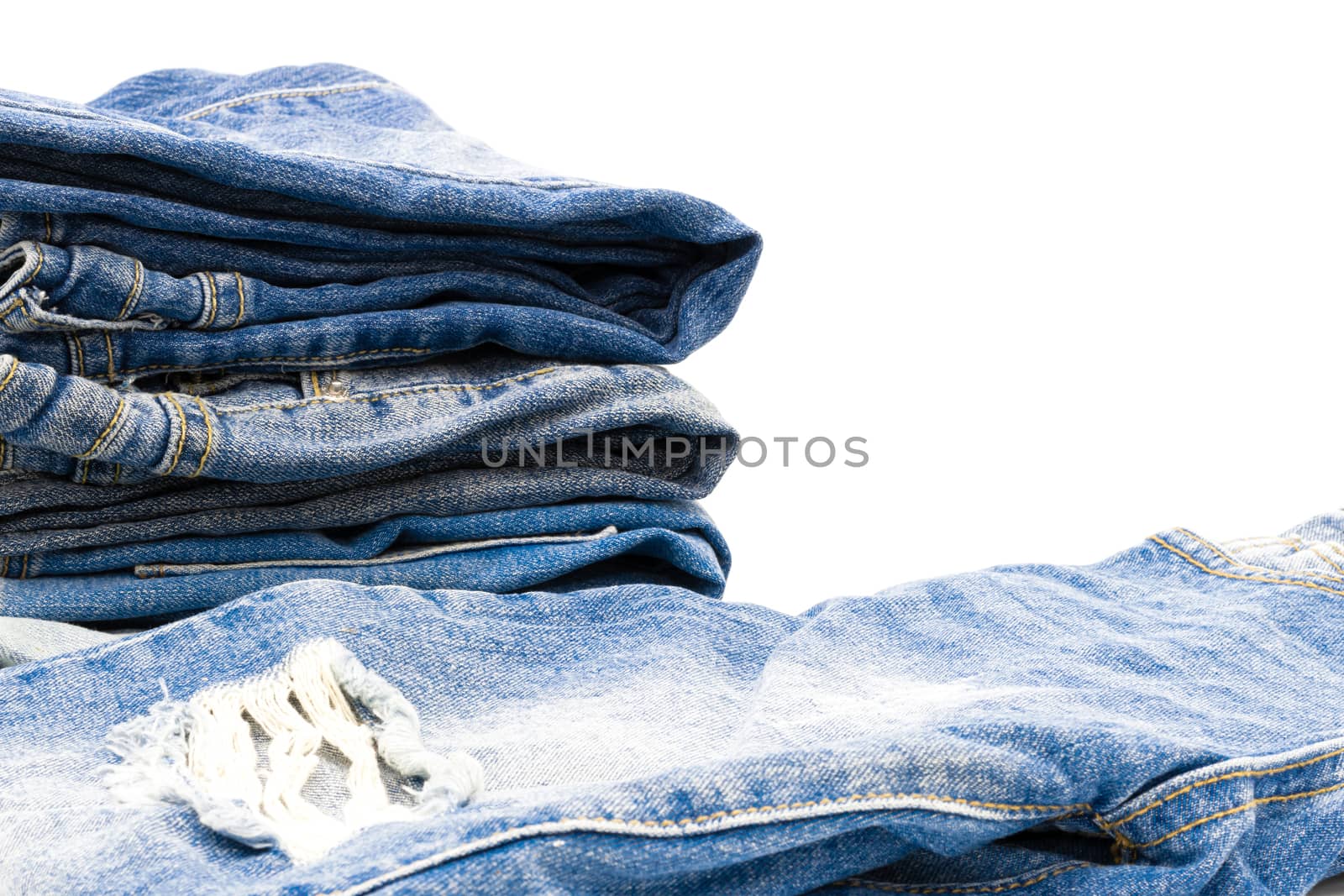 Jeans fold many on the white background by sompongtom