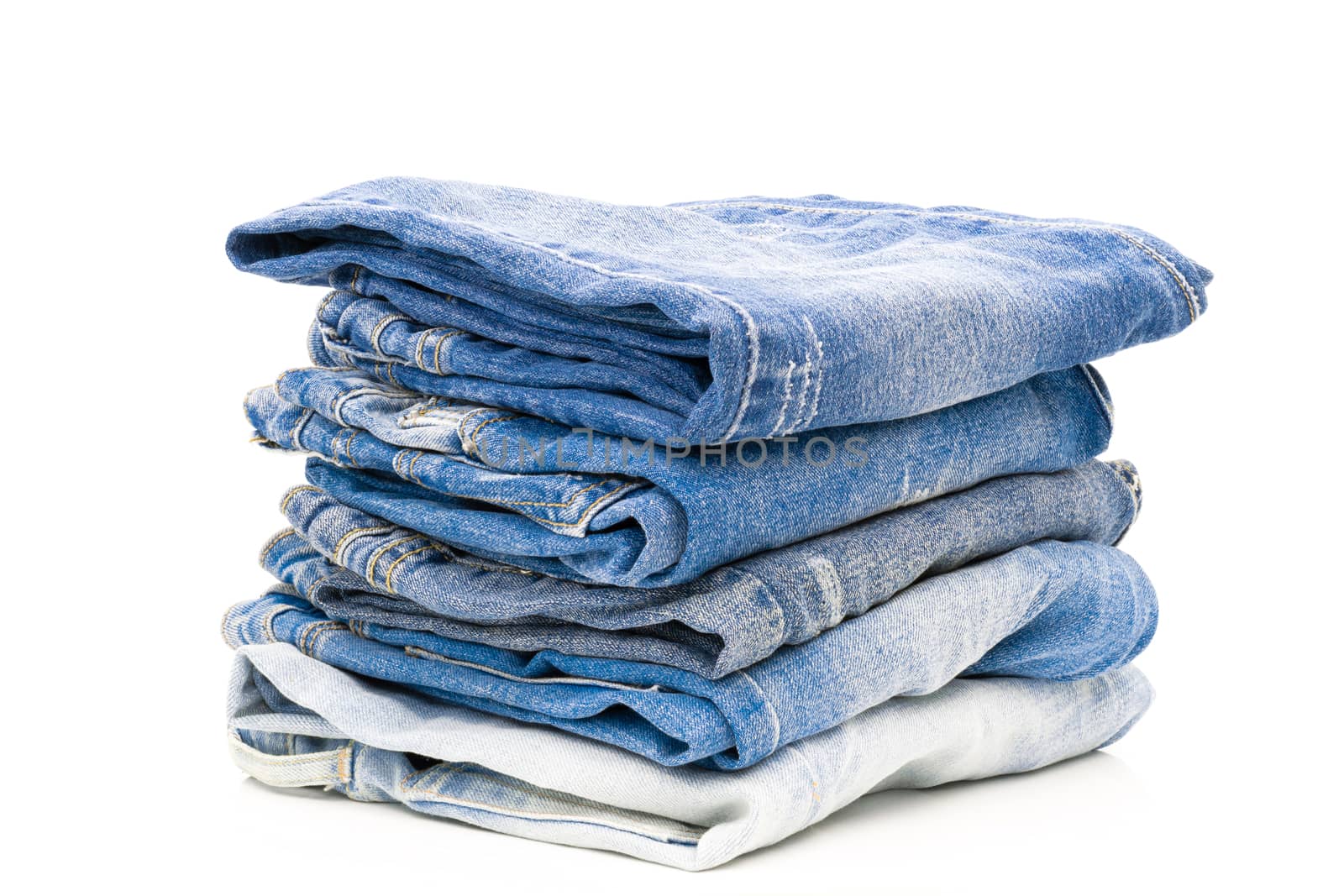 Jeans fold many on the white background by sompongtom