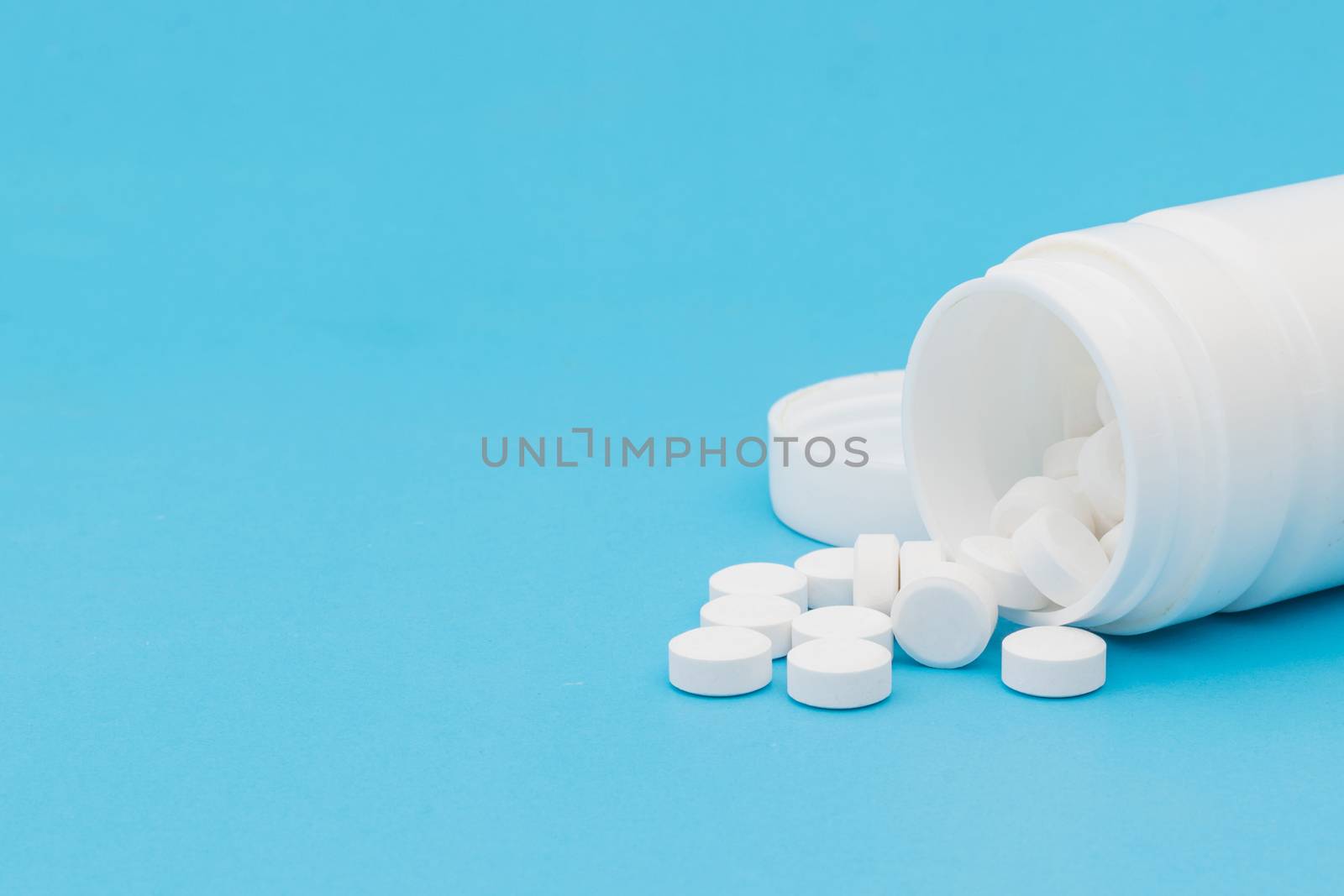 Tablet paracetamol the medical on a blue background