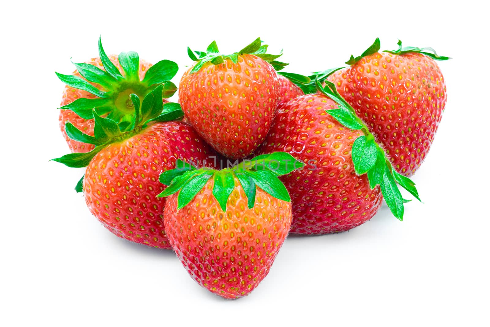 Fresh red strawberries on white background. by sompongtom