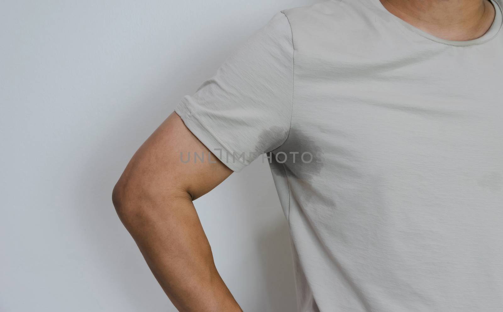 Men with sweating armpit and has a body odor by sompongtom