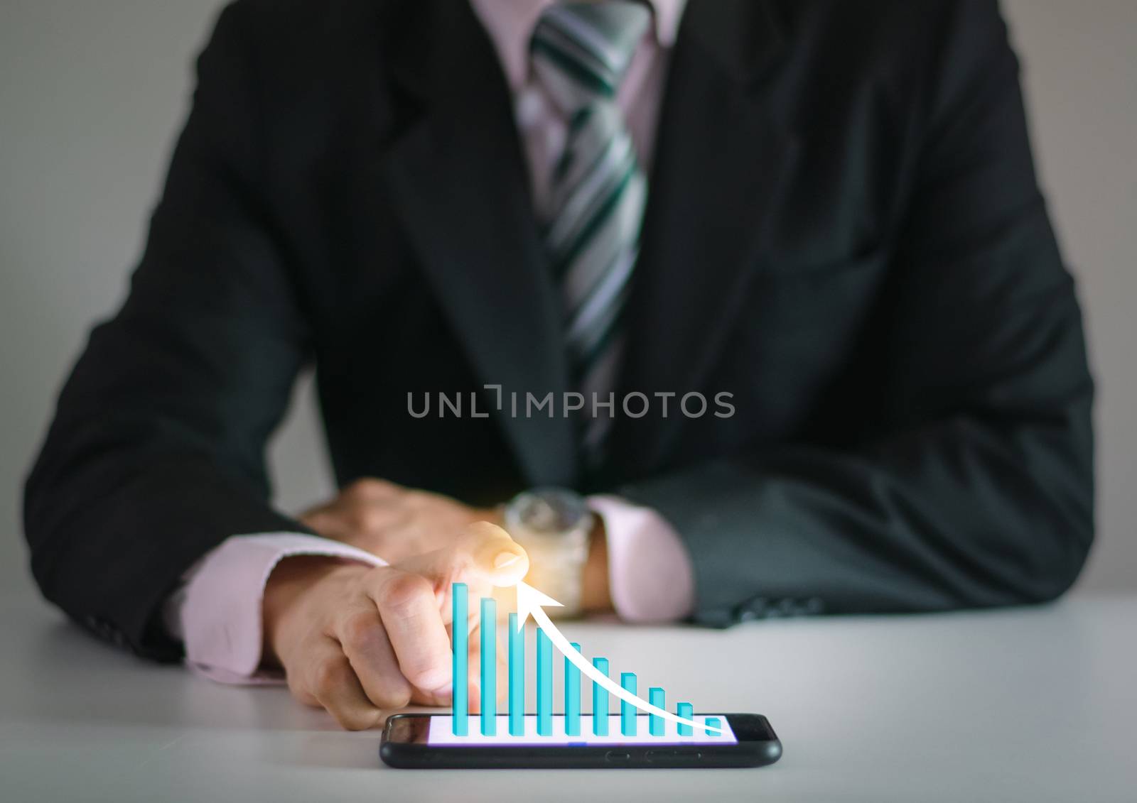 Business man show financial stock growth concept technology and graph display on smartphone by sompongtom