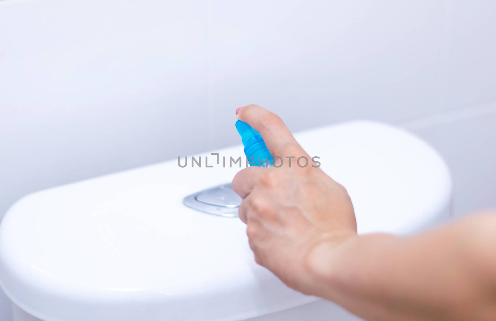 Alcohol spray press flush toilet clean protection against Coronavirus 2019 (Covid-19)