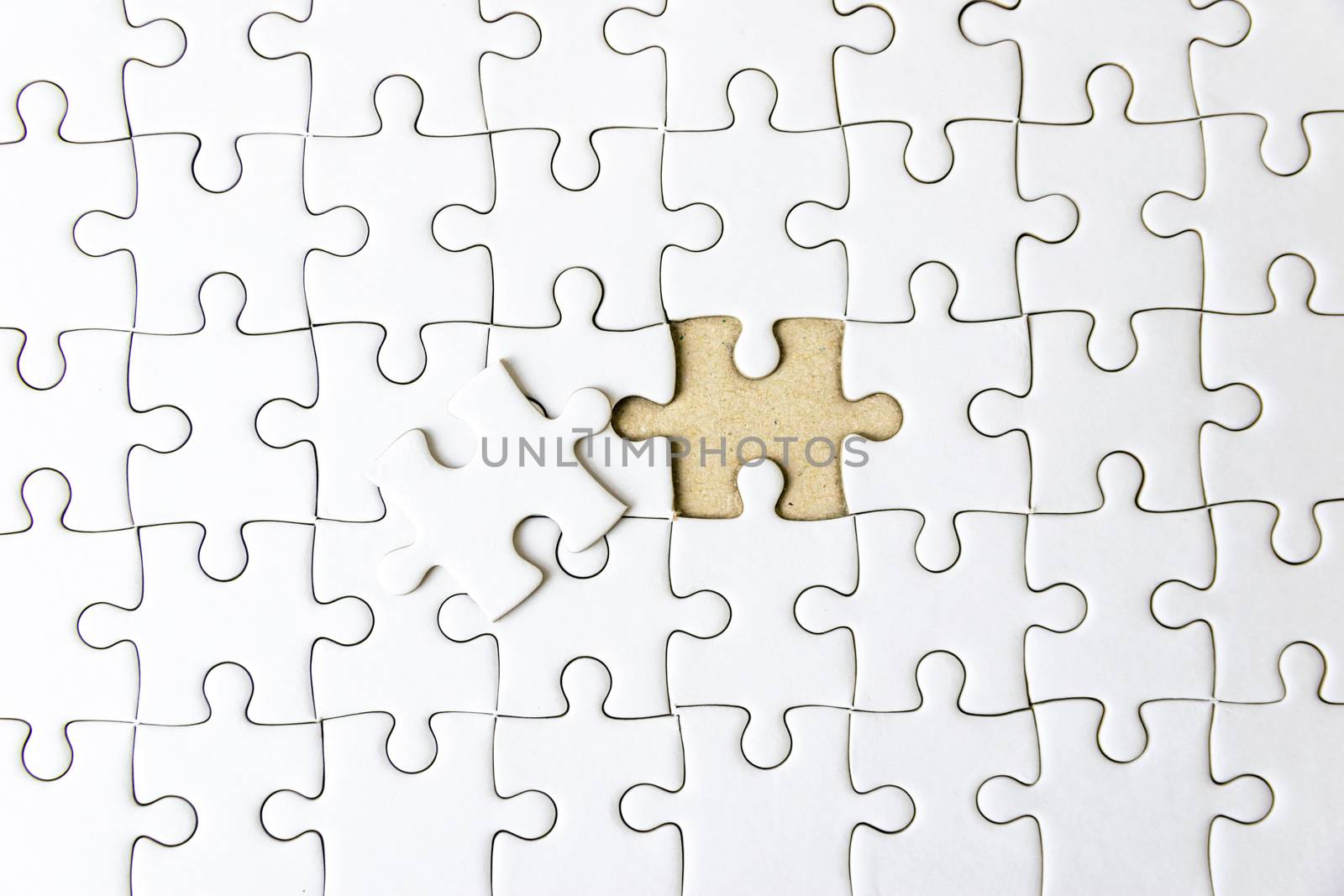 Fill the missing parts fragment of white jigsaw concept puzzle for succeed by sompongtom