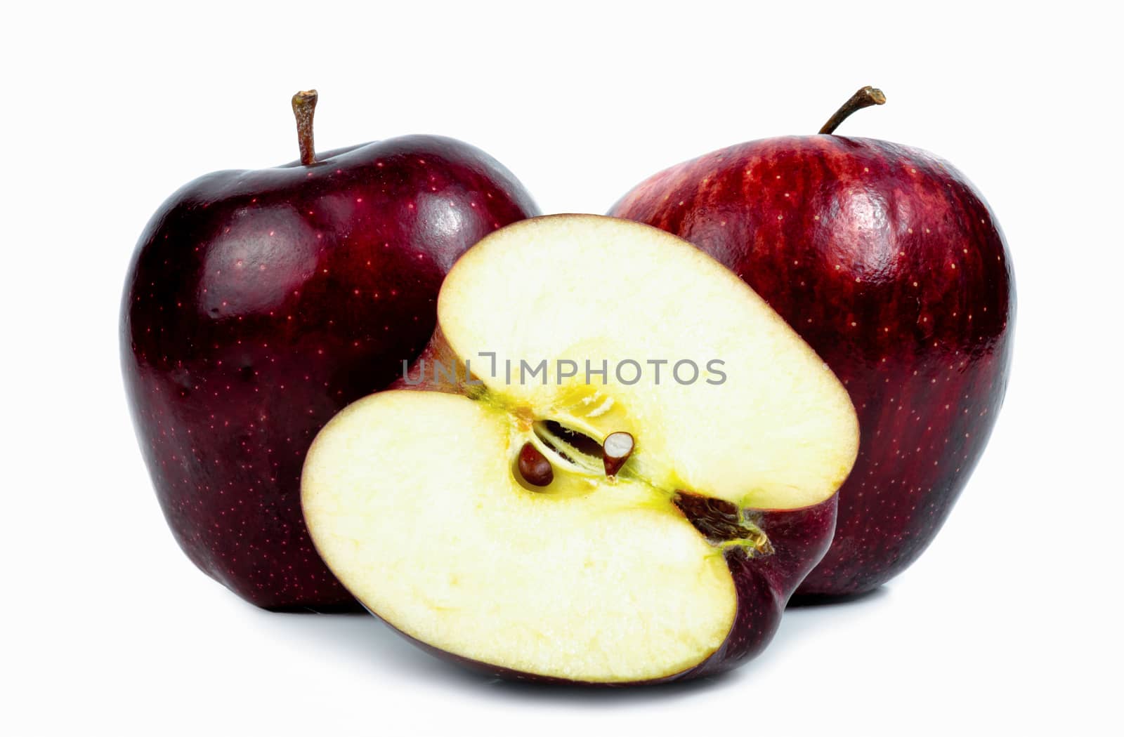 Fresh red apple on a white background by sompongtom