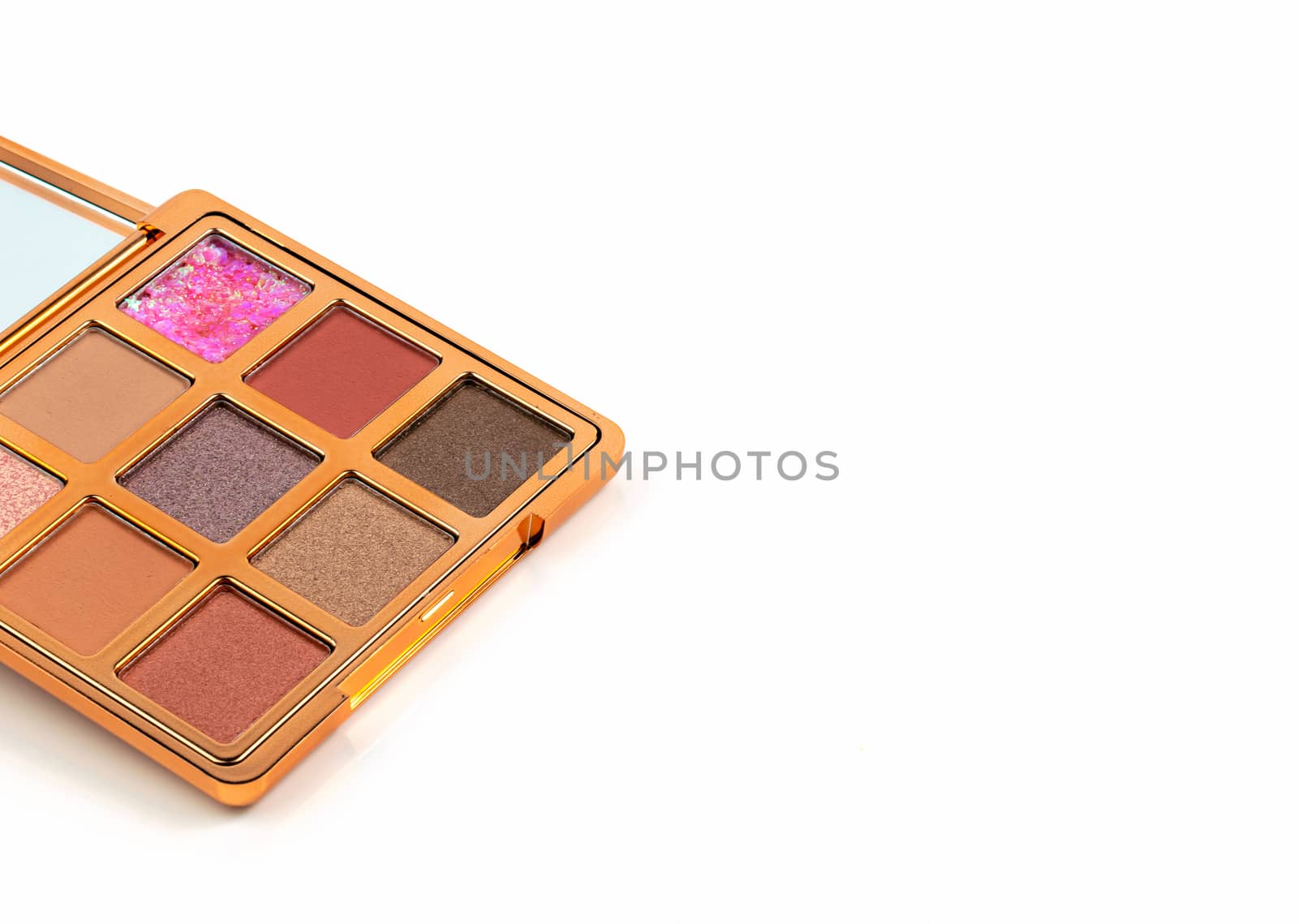 Palette of eyeshadows in Many colors tones on a white background by sompongtom