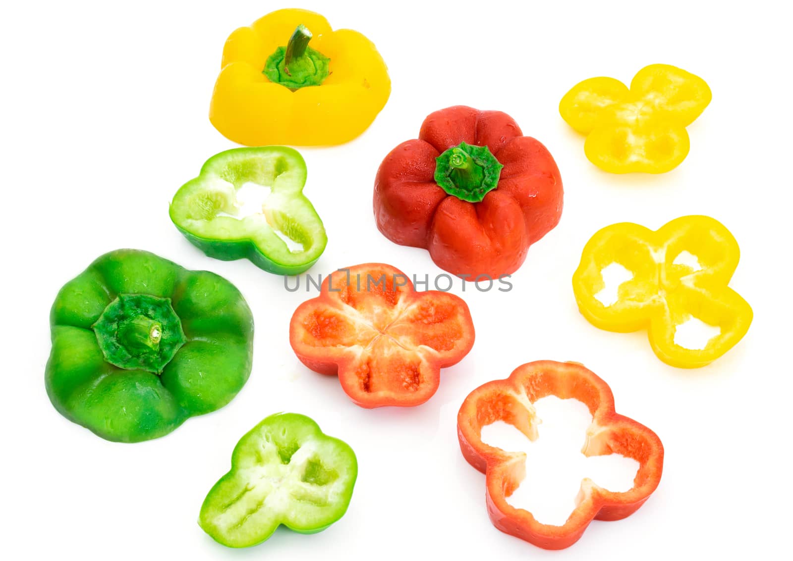 Large bell pepper red, green and yellow on a white background