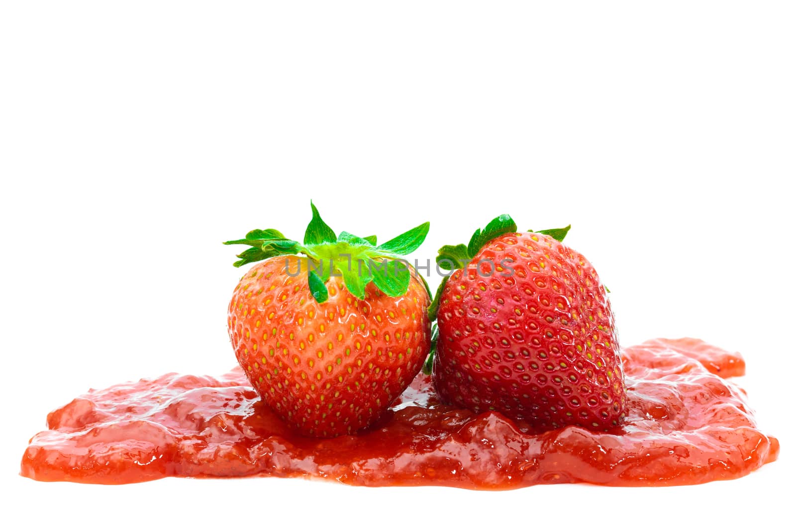 Strawberry and Jam on white background. by sompongtom