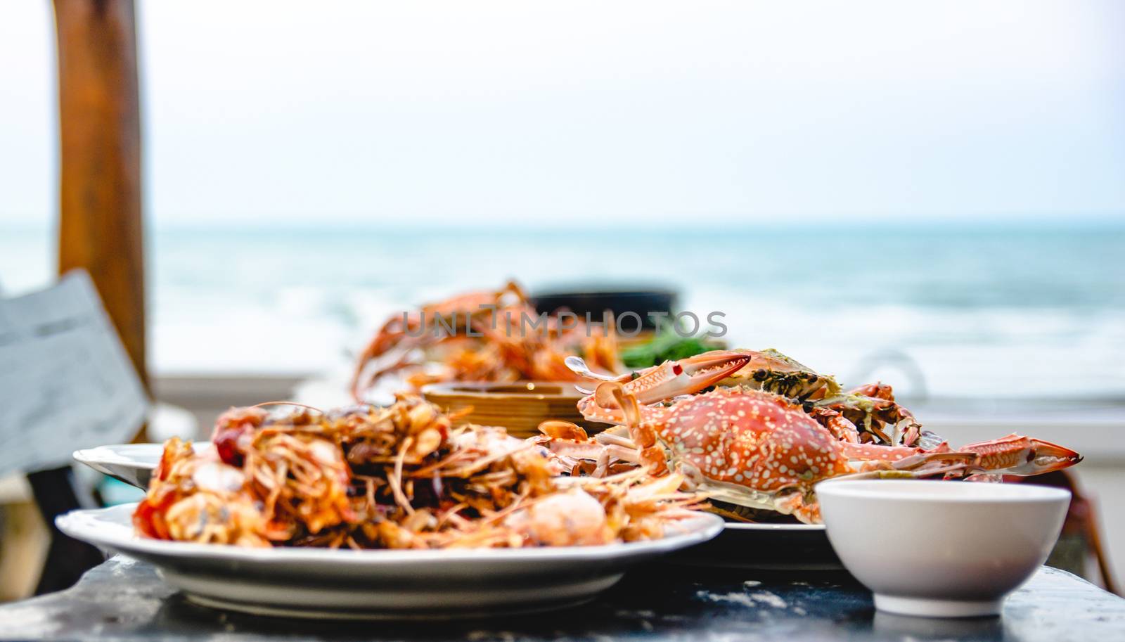 Seafood crab of restaurant with other dishes in the background