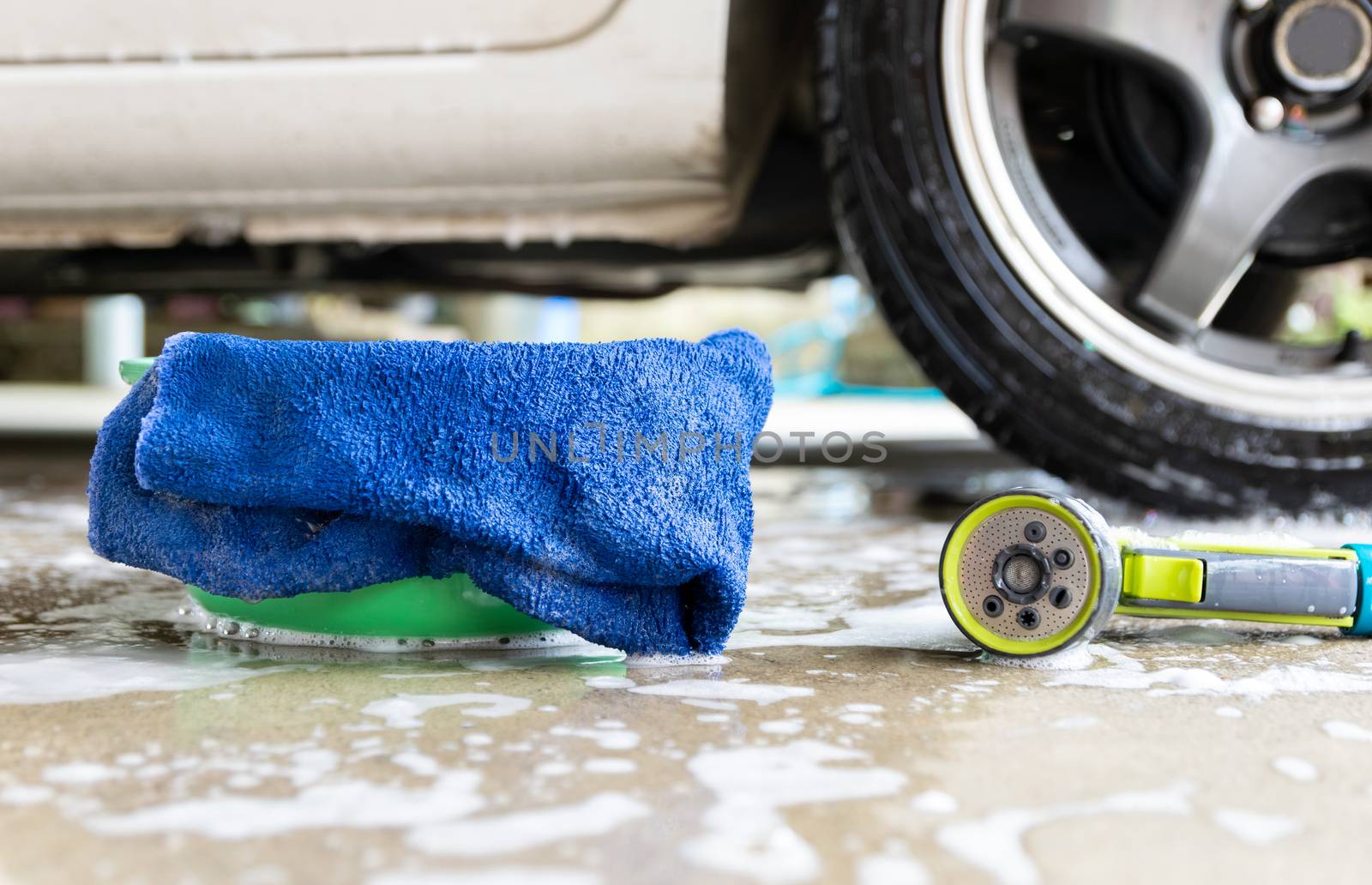 wash a car fabric and bubbles to clean the car