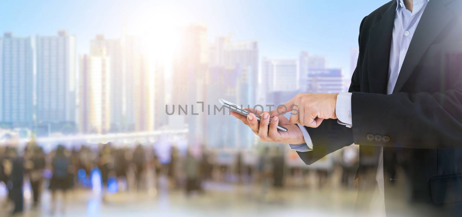 Business people hold smartphones using communication technology by sompongtom