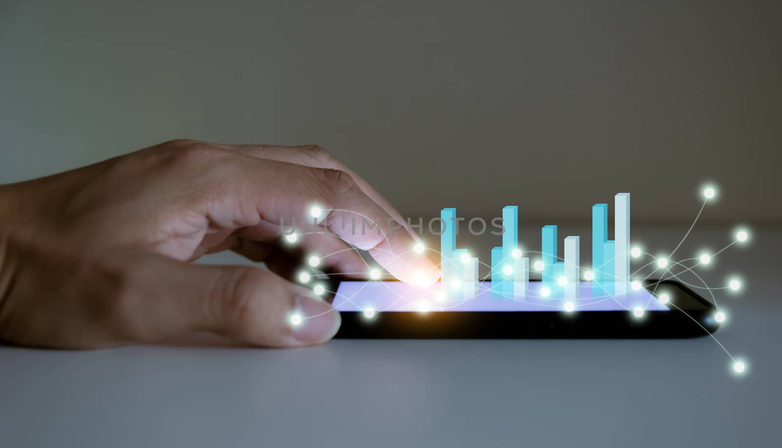 Business analyze graphs with the technology development pointing graph corporate to success and growing plan concept