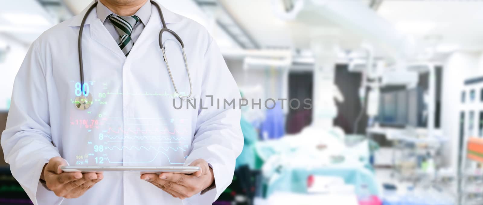 Medical technology the doctor held a tablet check the patient in the hospital by sompongtom