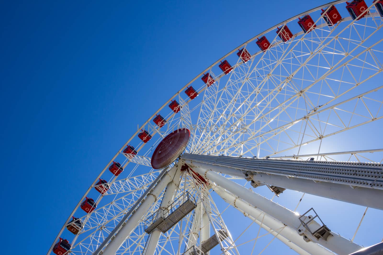 Jesolo, Italy, July 19 2016: ferris wheel on blue sky background.