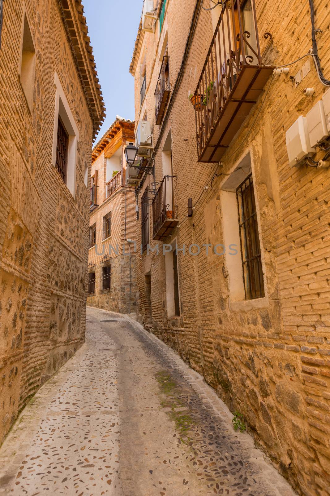Toledo Angel narrow street in Castile La Mancha, Spain