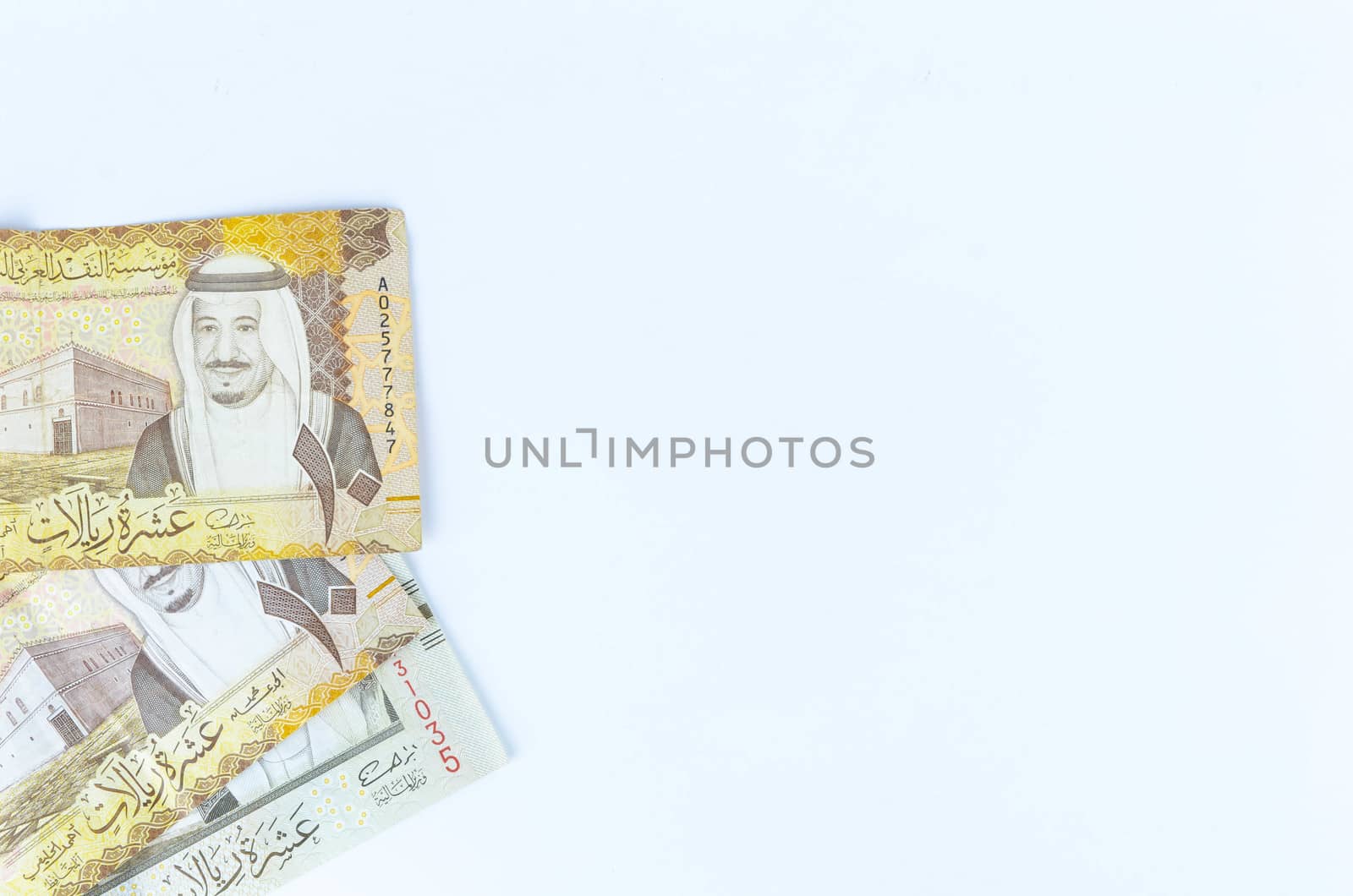 Saudi Arabia money on white background.