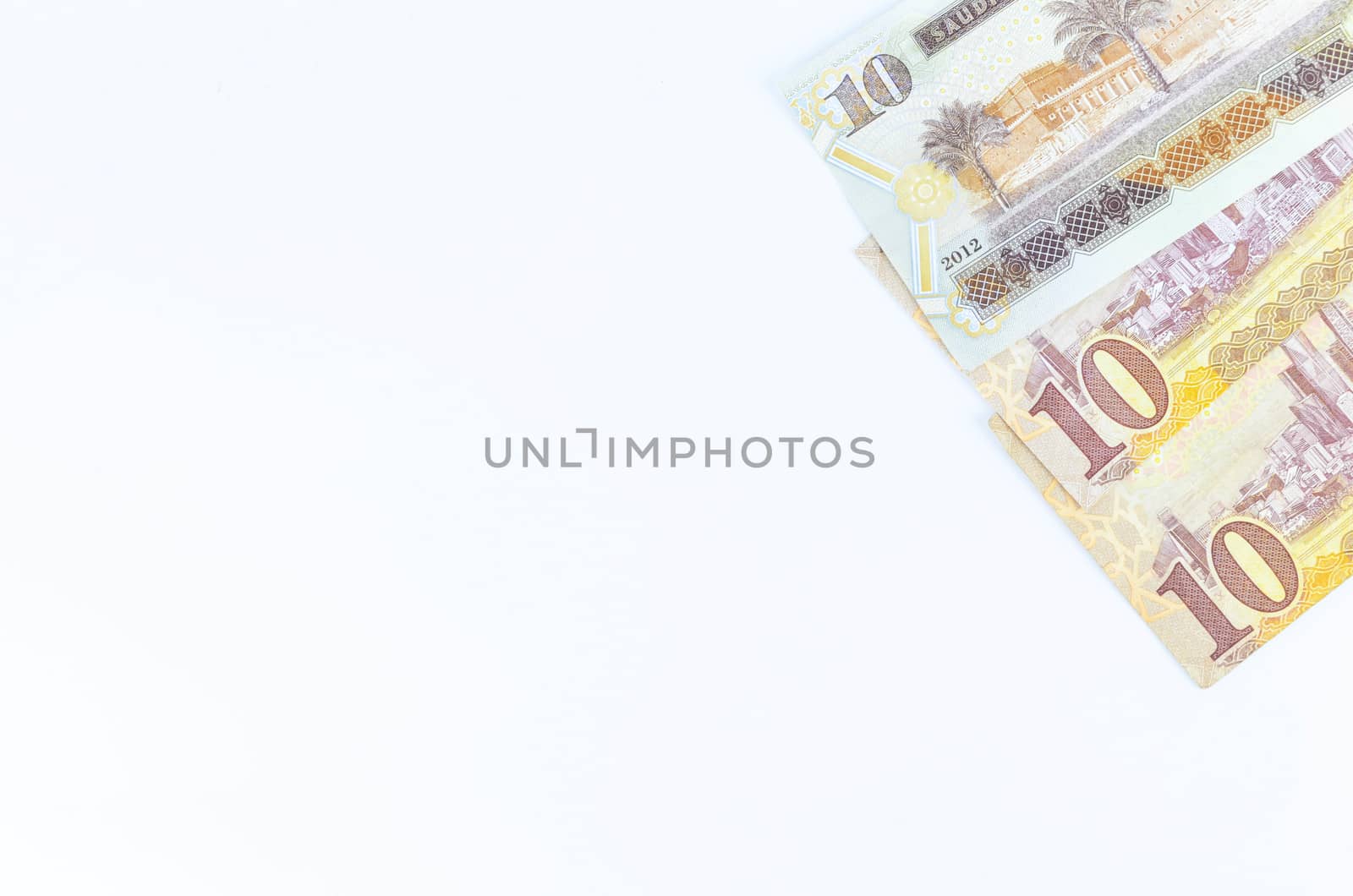 Saudi Arabia money on white background.