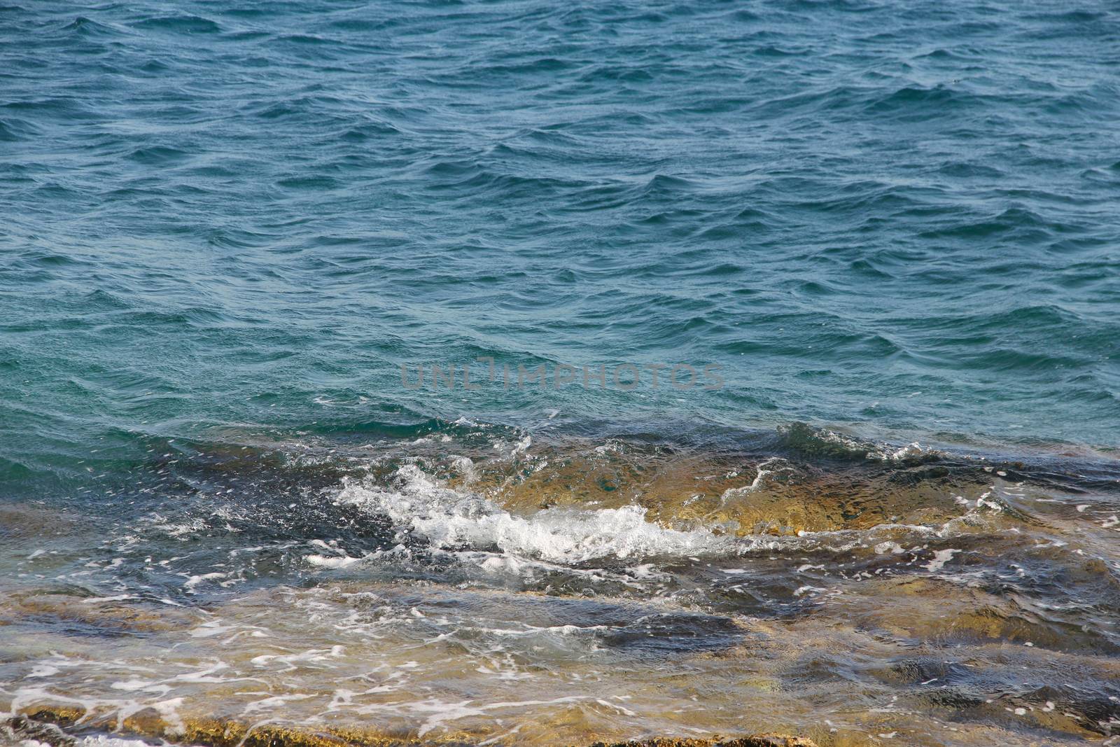 Wave of mediterranean sea close up natural background