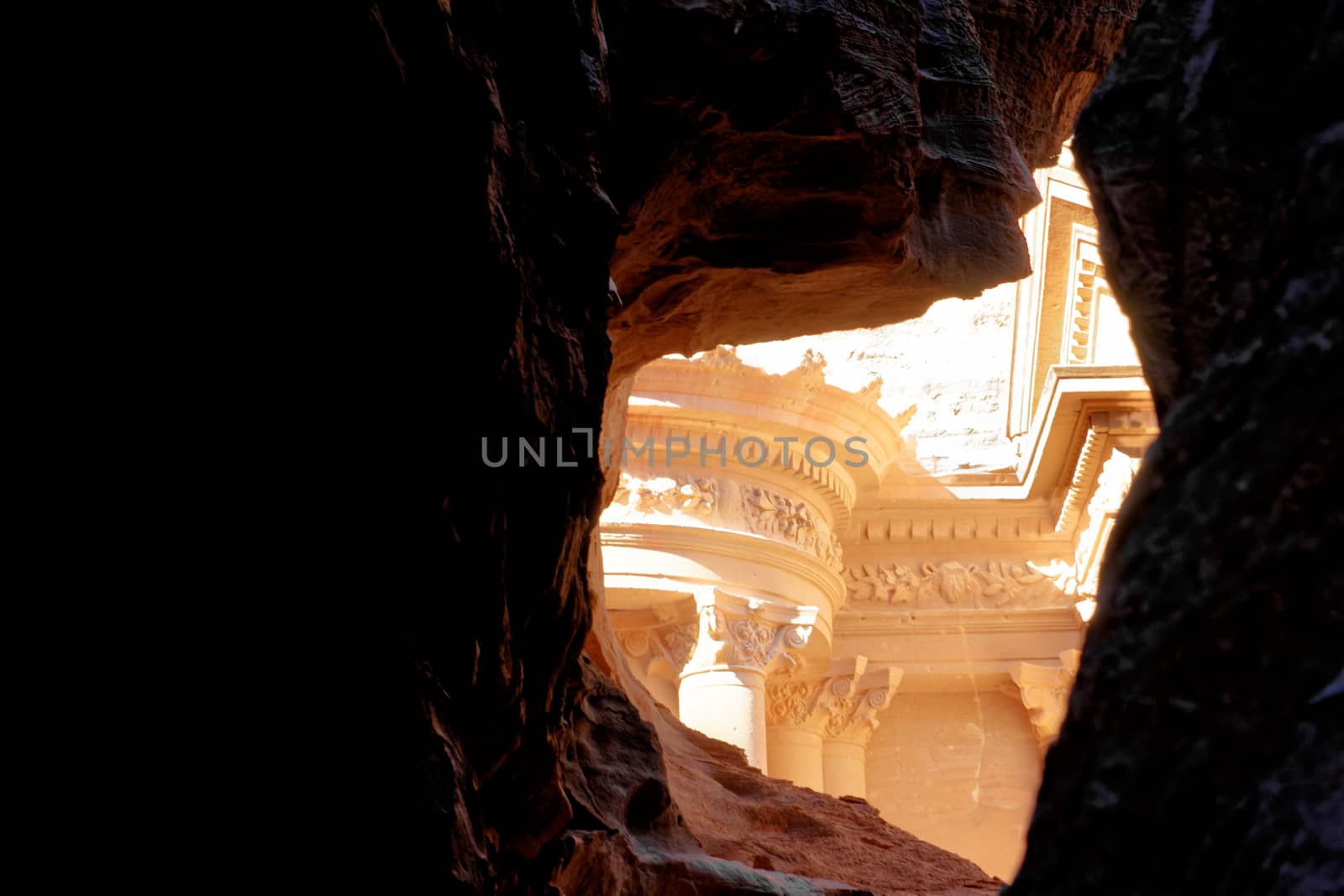 The treasure house of Petra from a perspective between the rocks in Wadi Musa, Petra, Jordan , middle east