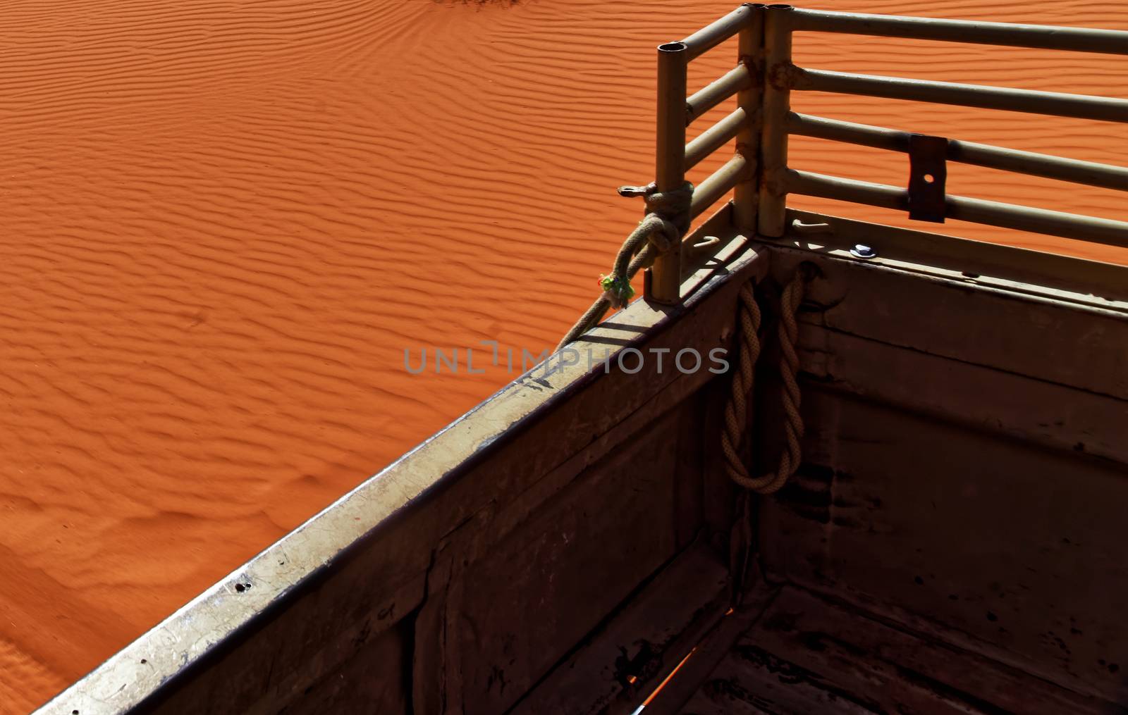 View from the platform of an off-road vehicle to the ripple marks in the desert sand of Wadi Rum, Jordan, middle east