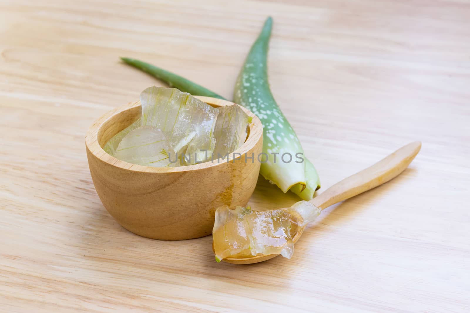 Aloe Vera for drinking on wood table 