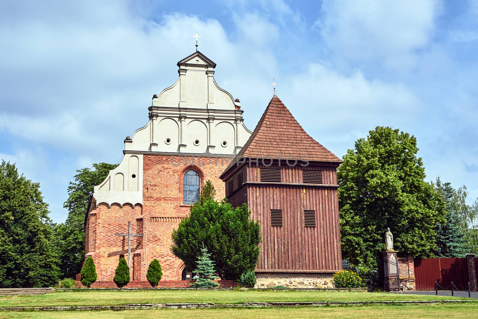 wooden belfry of the historic Gothic church in Poznan