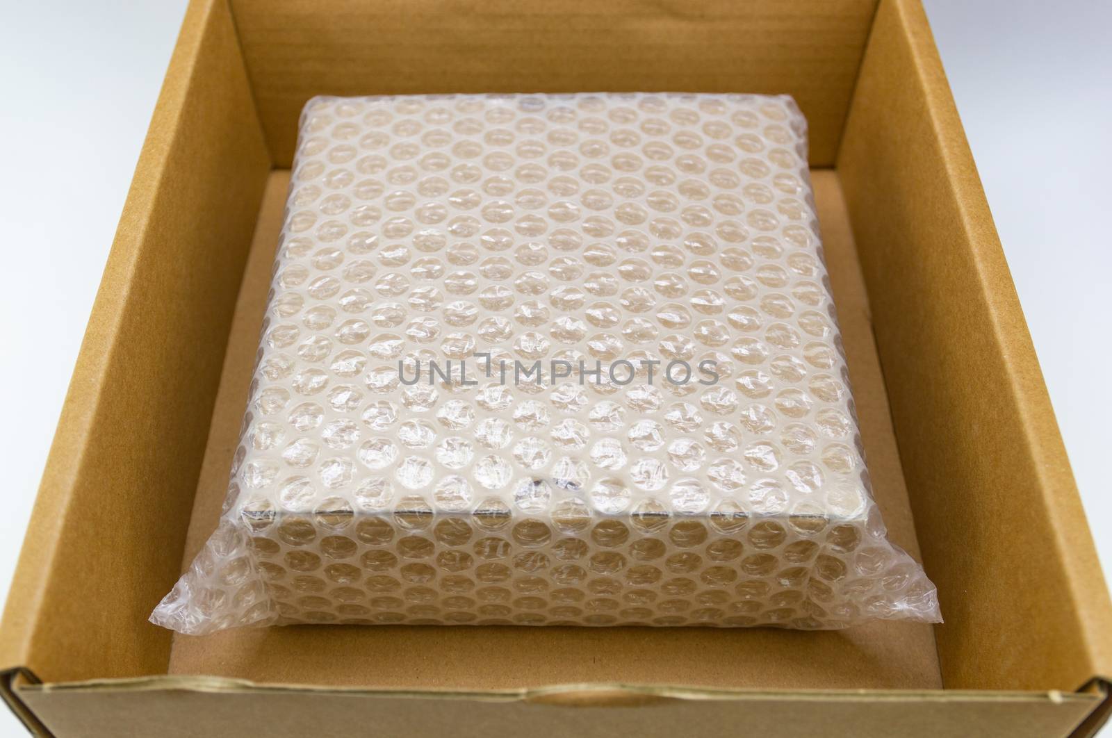 Bubbles covering the box by bubble wrap for protection product cracked  or insurance During transit 