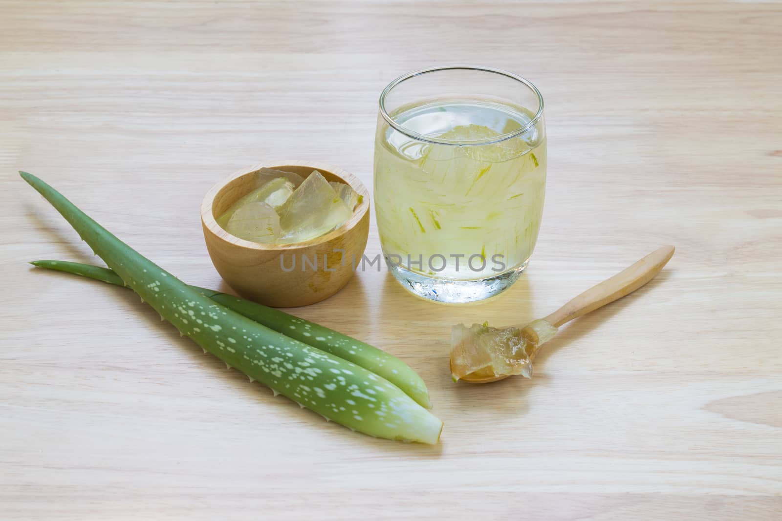 Aloe Vera for drinking on wood table 