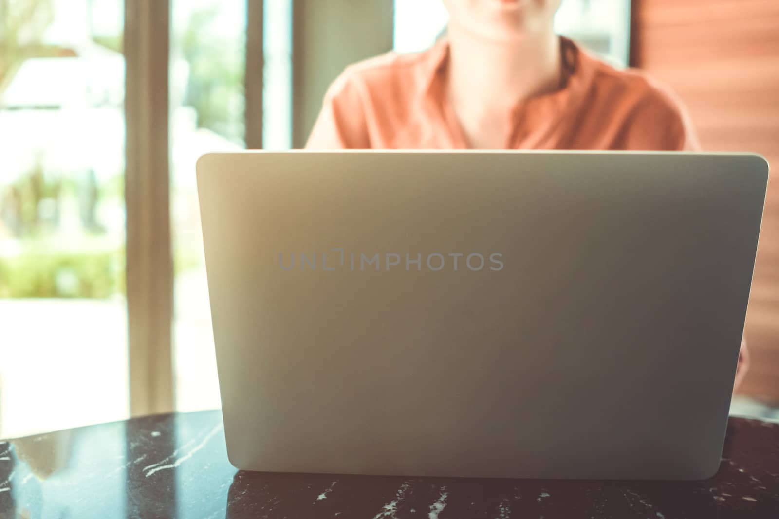 People using laptop to work study on work desk with clean nature background background. Business, financial, trade stock maket and social network. by Suwant