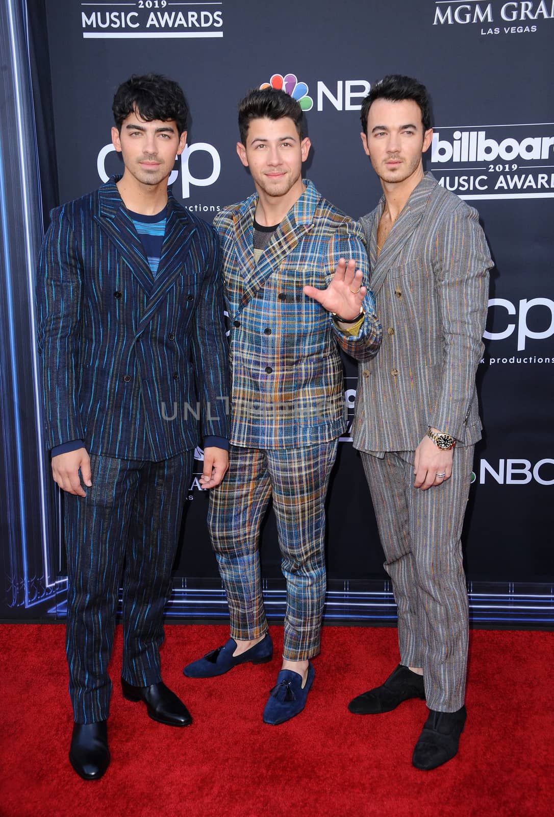 Joe Jonas, Nick Jonas and Kevin Jonas by Lumeimages
