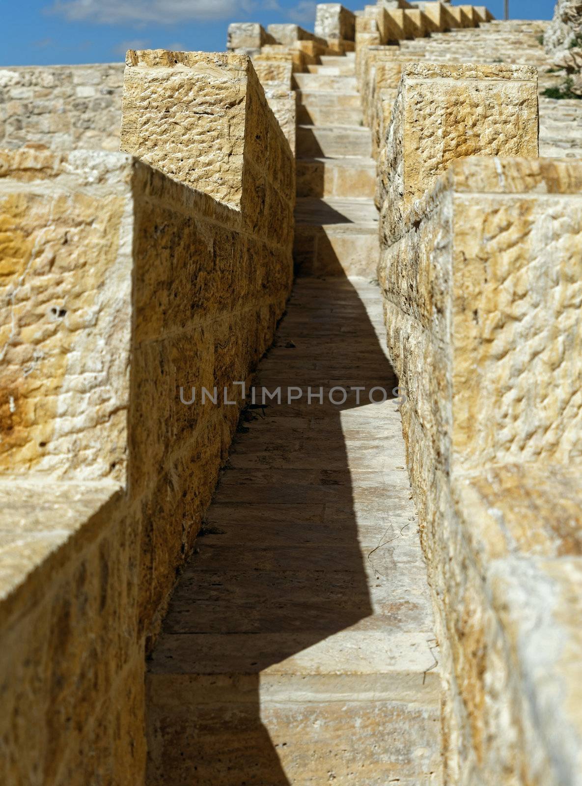 Narrow stairway on the outer wall of the large Crusader fortress in Karak, Jordan, middle east