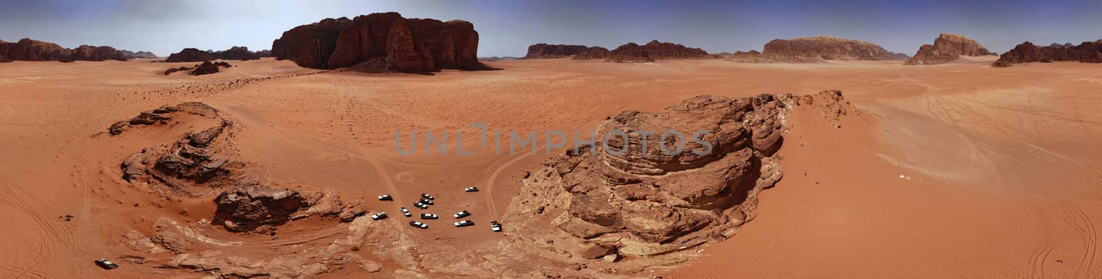 Composite panorama of high resolution aerial photos of a monolithic mountain in the central area of the desert reserve of Wadi Rum, Jordan by geogif