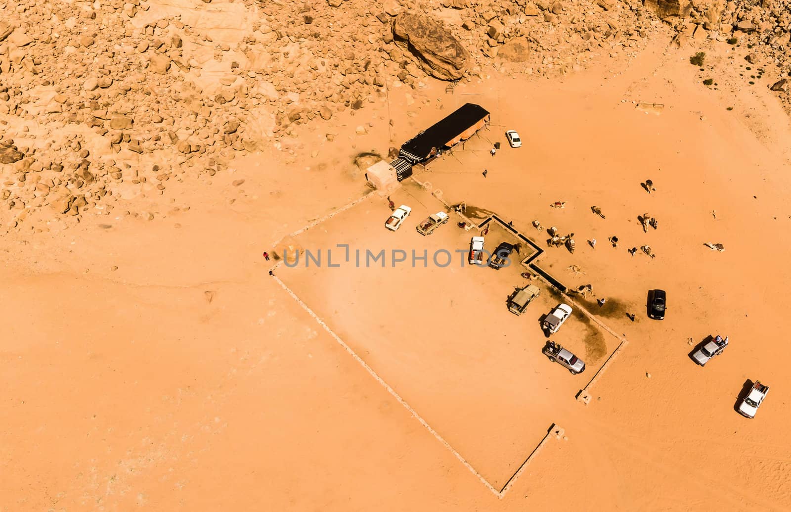 Aerial view of the Lawrence spring in the Jordanian desert near Wadi Rum, made with drone