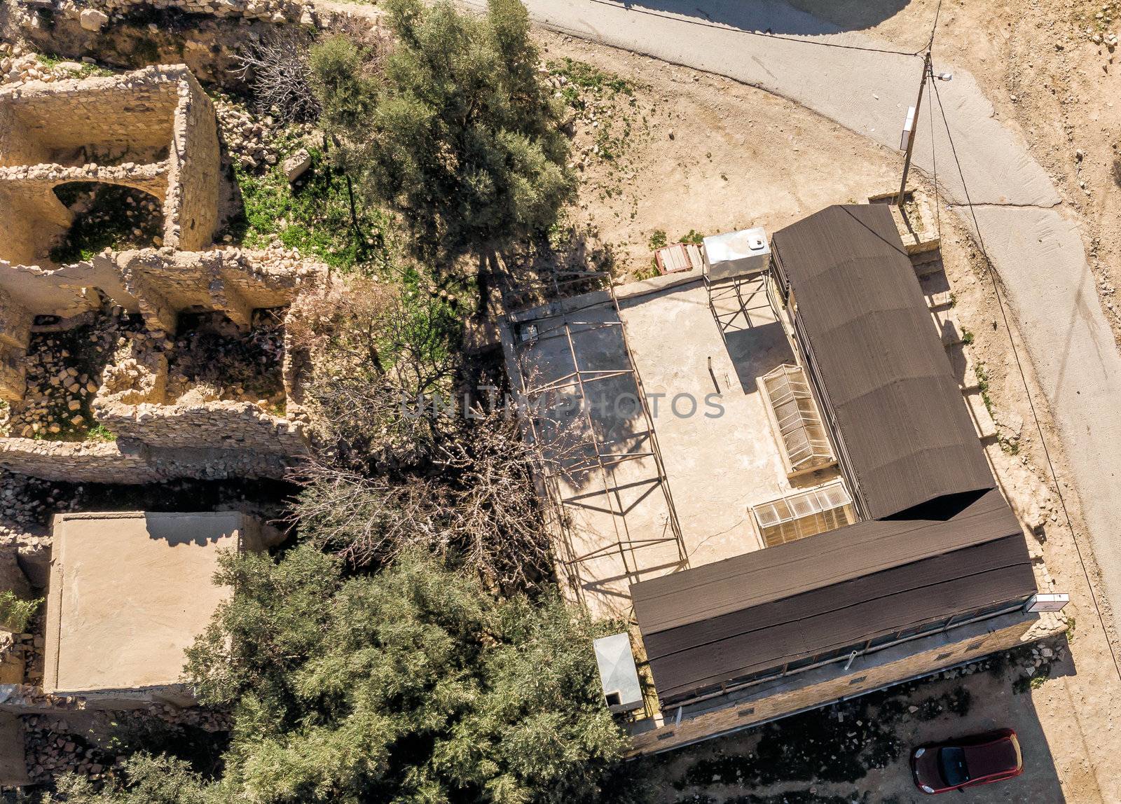 Aerial view of the village Dana and its surroundings at the edge of the Biosphere Reserve of Dana in Jordan, made with drone