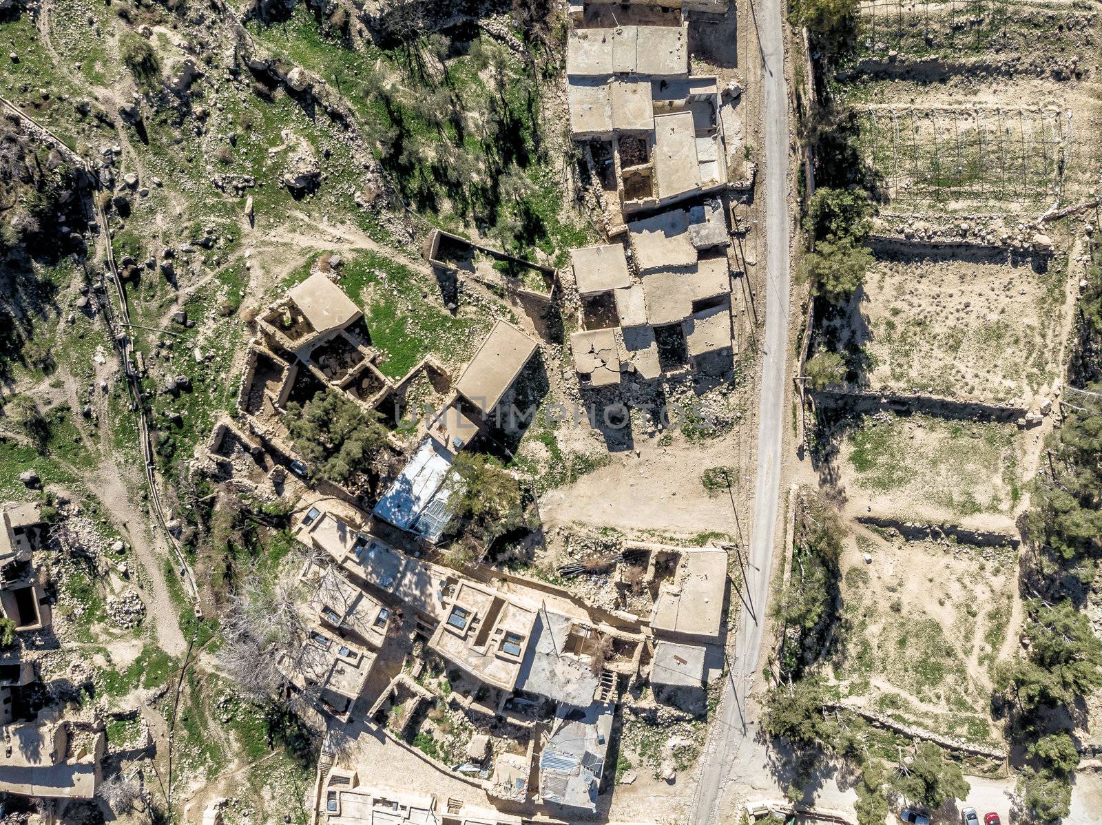 Aerial view of the village Dana and its surroundings at the edge of the Biosphere Reserve of Dana in Jordan, made with drone