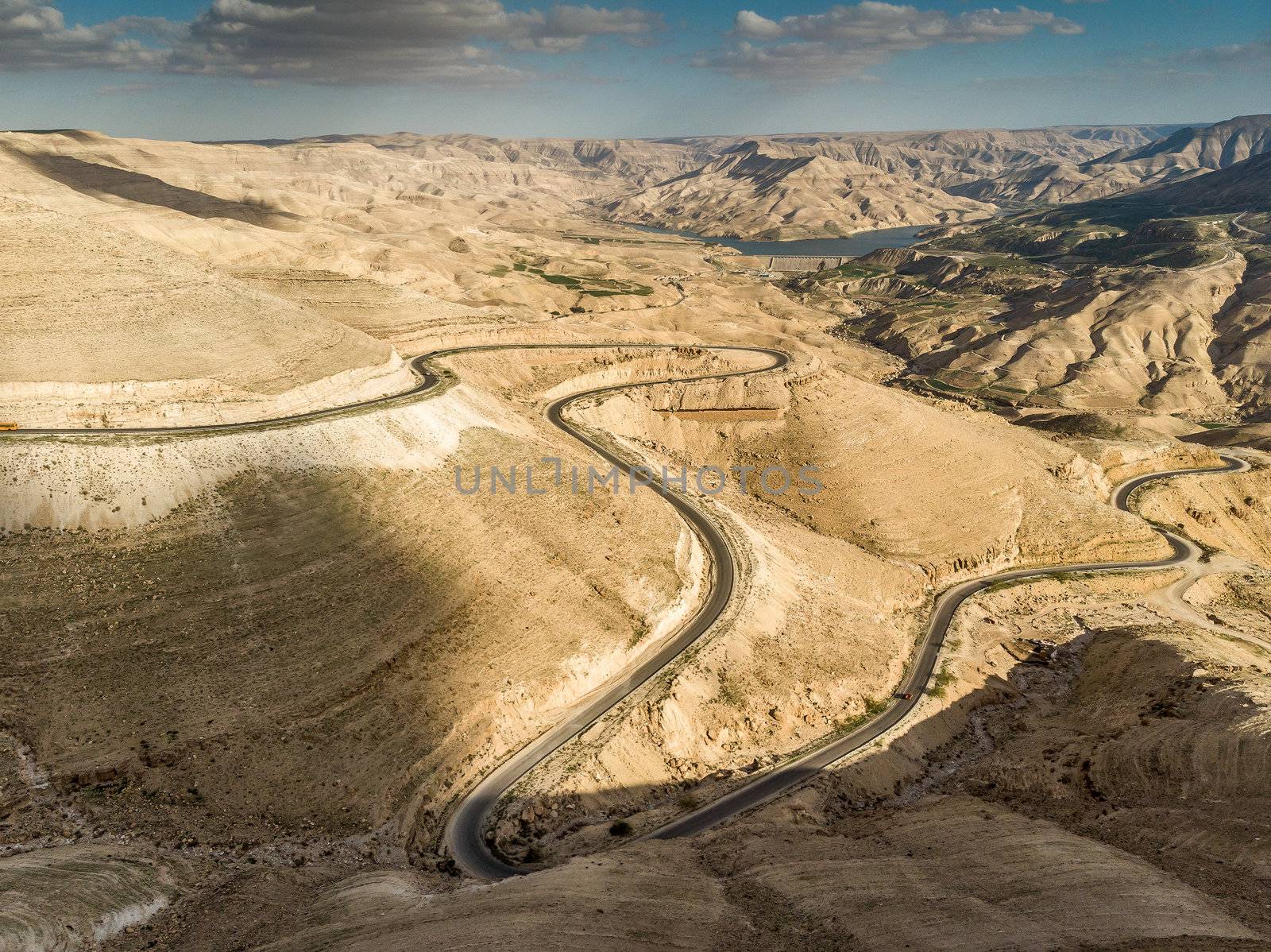 Panoramic view of the King Highway ascending the road north of the Wadi Mujib reservoir in Jordan.